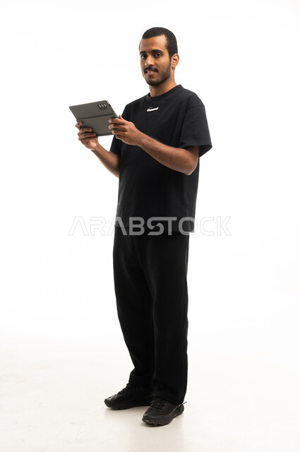 Saudi Man with Digital Tablet on White Background