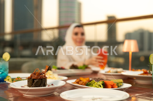 Arabic Food Table on Rooftop Restaurant at Sunset