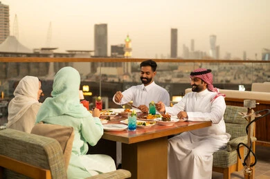 Saudi Couples Dining at Riyadh Rooftop Restaurant