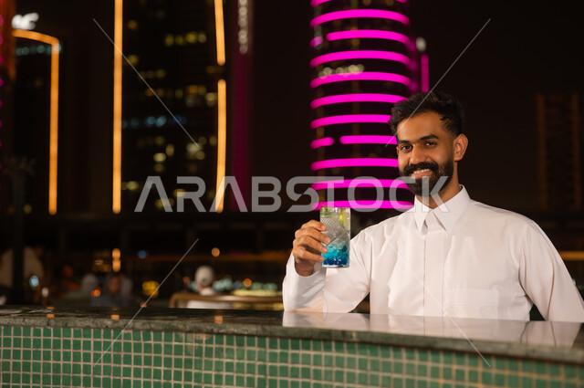 Saudi Man with Mocktail at Night City Lounge
