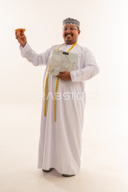 Omani Man Holding Pizza and Weight Scale on White Background