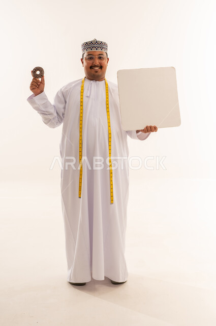 Omani Man Holding Donut and Blank Board Studio