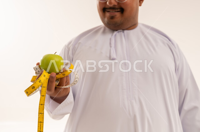 Arab Man with Green Apple and Measuring Tape