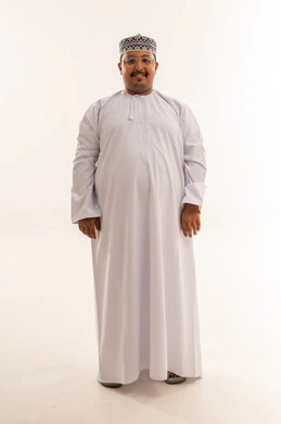 Overweight Omani Man in Traditional Dress Studio Portrait