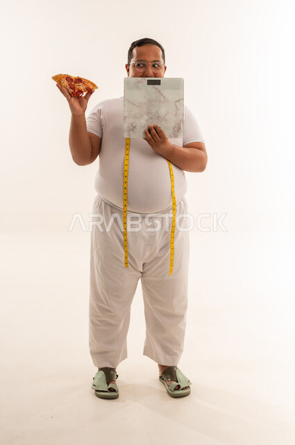 Overweight Arab Man with Pizza and Weighing Scale