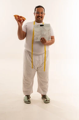 Overweight Saudi Man with Pizza and Weighing Scale