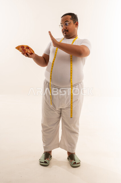 Overweight Saudi Man Refusing Pizza with Measuring Tape