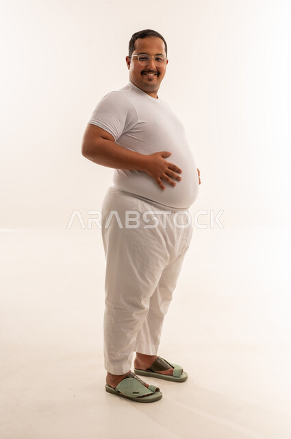 Overweight Saudi Man Smiling in Studio Portrait