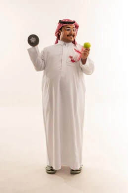 Saudi Man with Dumbbell and Apple Studio Portrait