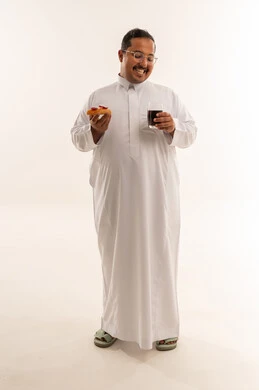 Overweight Saudi Man with Donut and Soda in Studio