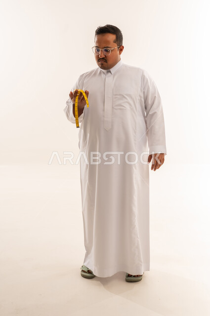 Saudi Man with Measuring Tape on White Background