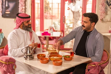 Saudi Men Dining at a Traditional Arabic Restaurant