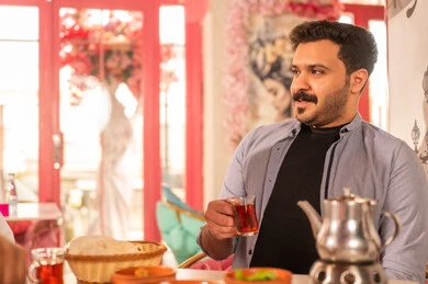 Saudi Man Drinking Traditional Tea in Restaurant