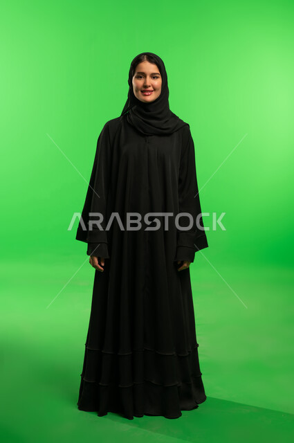Saudi Woman in Black Abaya on Green Screen