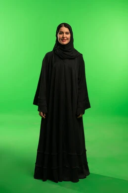 Saudi Woman in Black Abaya on Green Screen