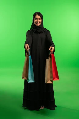 Saudi Woman with Shopping Bags on Green Screen