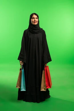 Saudi Woman with Shopping Bags on Green Screen