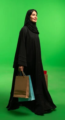 Saudi Woman with Shopping Bags on Green Screen