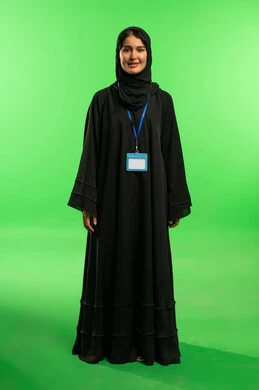 Saudi Woman in Abaya on Green Screen with ID Badge
