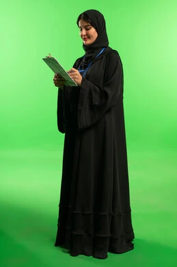 Saudi Woman with Clipboard on Green Screen Background