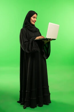 Saudi Woman with Laptop on Green Screen Background