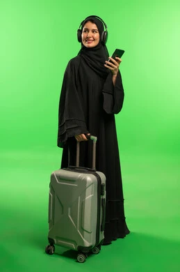 Saudi Woman with Suitcase on Green Screen Background
