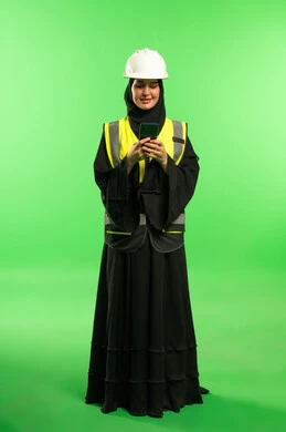 Saudi Female Engineer using Smartphone on Green Screen