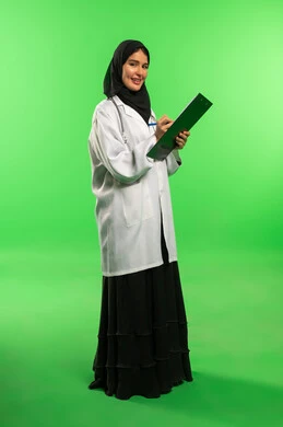 Saudi Female Doctor with Clipboard on Green Screen