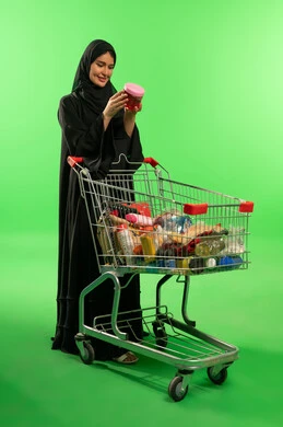 Saudi Woman with Shopping Cart on Green Screen