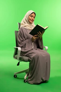 Saudi Woman Reading Book on Green Screen