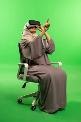 Saudi Woman Using VR Goggles on Green Screen