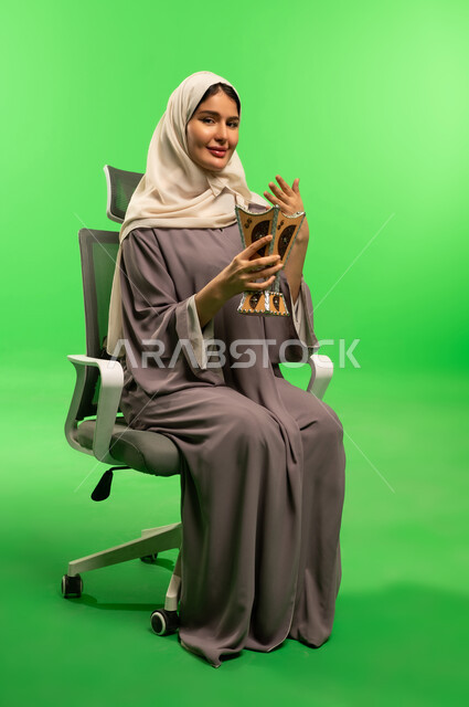 Saudi Woman with Traditional Incense Burner on Green Screen