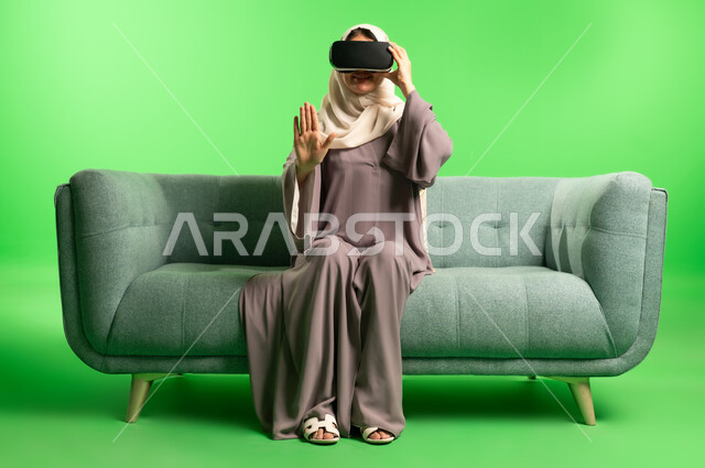 Saudi Woman with VR Headset on Green Screen