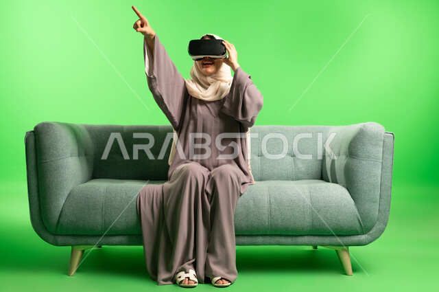 Saudi Woman with VR Headset on Green Screen
