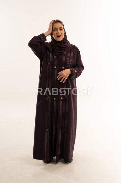 Saudi Woman in Abaya Expressing Pain and Fatigue