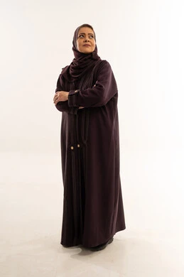 Saudi Woman in Purple Abaya on White Background