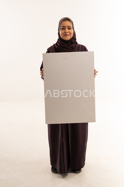 Saudi Woman Holding Large Blank White Board