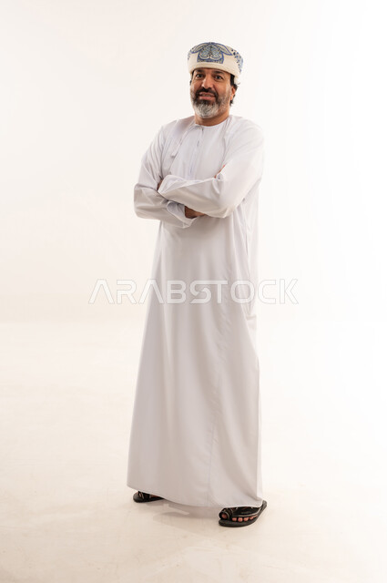 Omani Man in Traditional Dishdasha on White Background