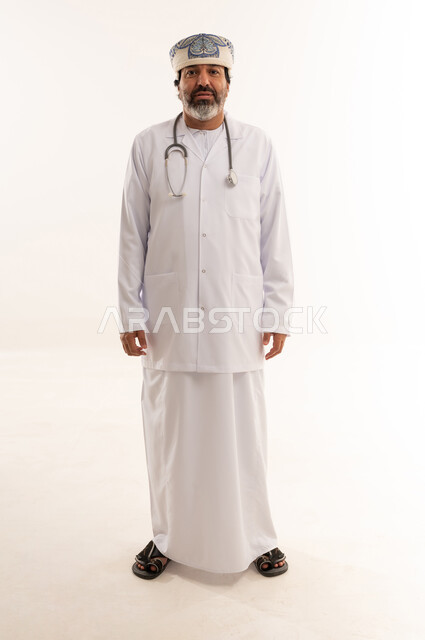 Omani Male Doctor in Medical Coat on White Background