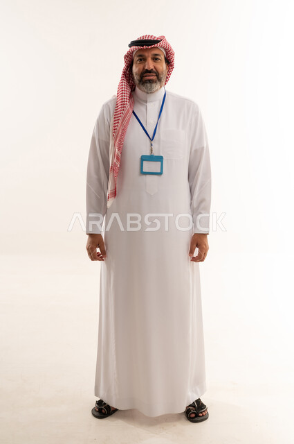 Saudi Man in Traditional Thobe with ID Badge Portrait