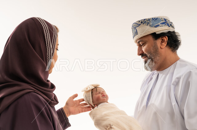 Omani Family with Newborn Baby in Studio