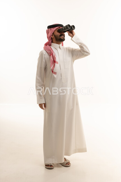 Saudi Man Using Binoculars on White Background Studio