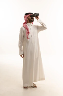 Saudi Man Using Binoculars on White Background Studio