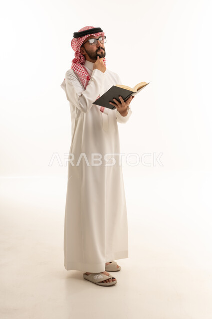 Saudi Man Reading Book on White Background