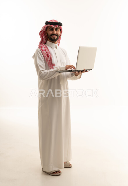 Saudi Man with Laptop on White Background