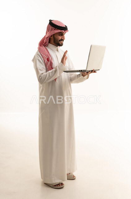 Saudi Man Waving During Laptop Video Call
