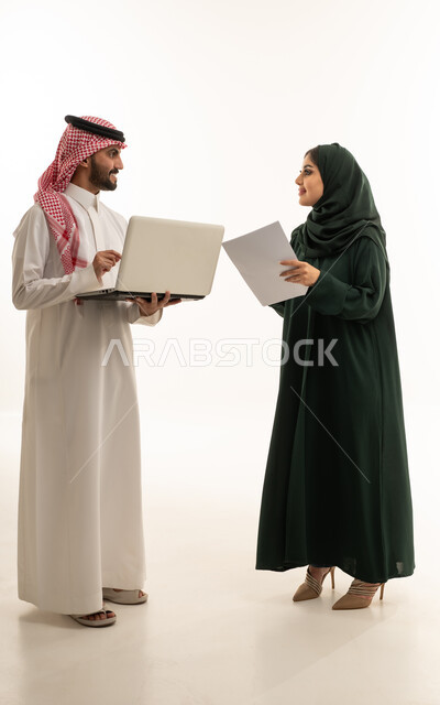 Saudi Business Man and Woman Working in Studio