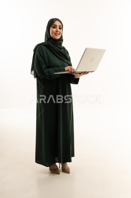 Saudi Businesswoman with Laptop on White Background