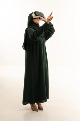 Arab Woman Wearing VR Headset on White Background