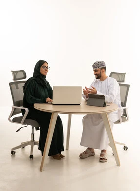 Omani Businessman and Arab Woman in Studio Meeting